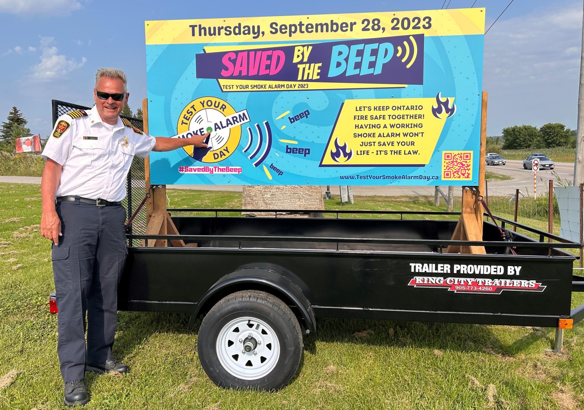 Fire Chief with Saved by the Beep sign