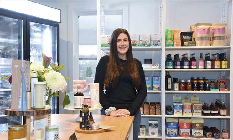 Photo of Molly Robins, owner of Molly's Market in King City - a health food store that focuses on vegan and gluten free options and gift items