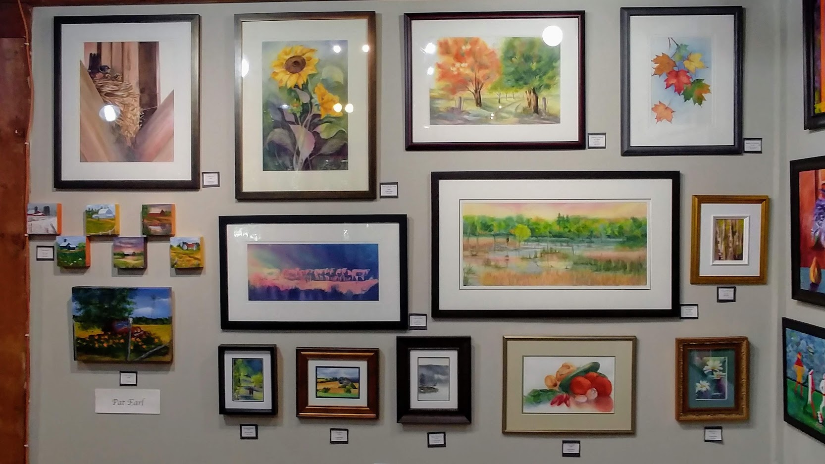 Image of multiple paintings at the Olde Mill Gallery in Schomberg