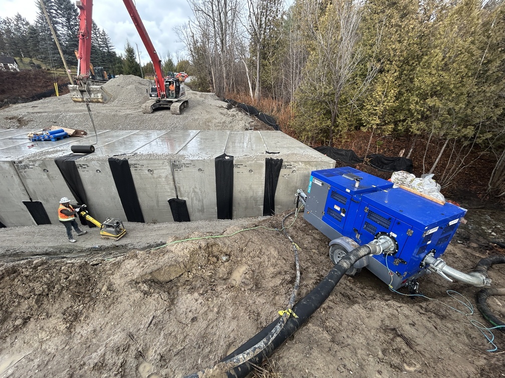 Staff conducting culvert replacement