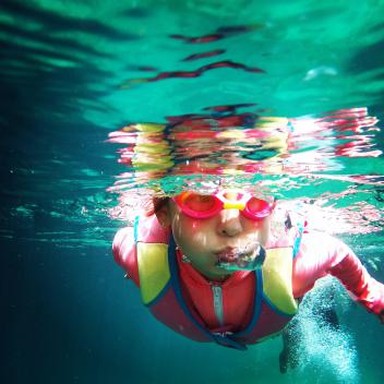 Child swimming underwater