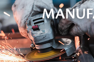 Manufacturing - Our Economy Website Header - image of person grinding metal with sparks flying