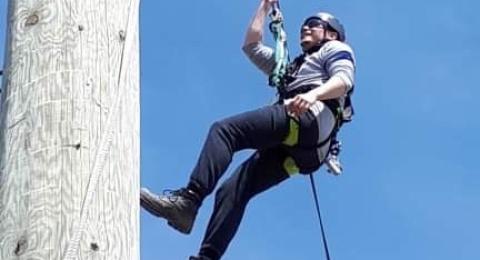 person climbing at cold creek course